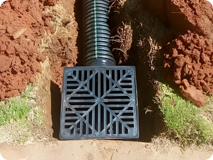 Drainage system with black grate cover