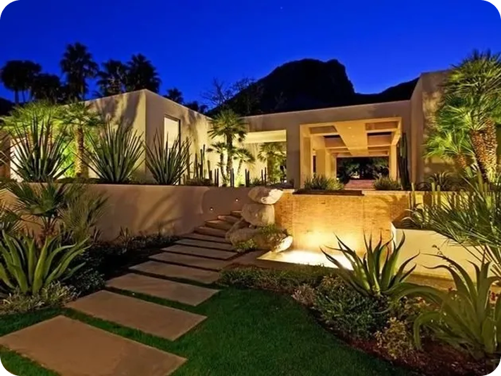 Modern house with garden at night