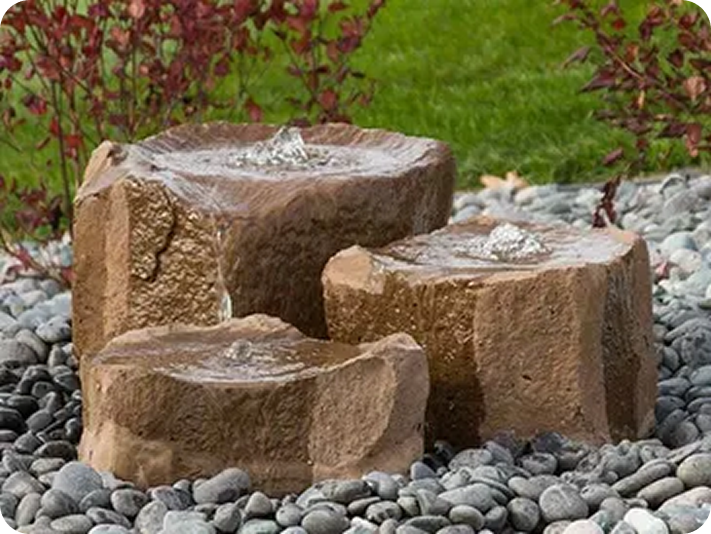 Stone fountains surrounded by pebbles