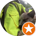 Dog cuddling in yellow jacket