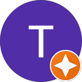 Letter T with orange star badge
