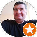 Man smiling with star badge icon